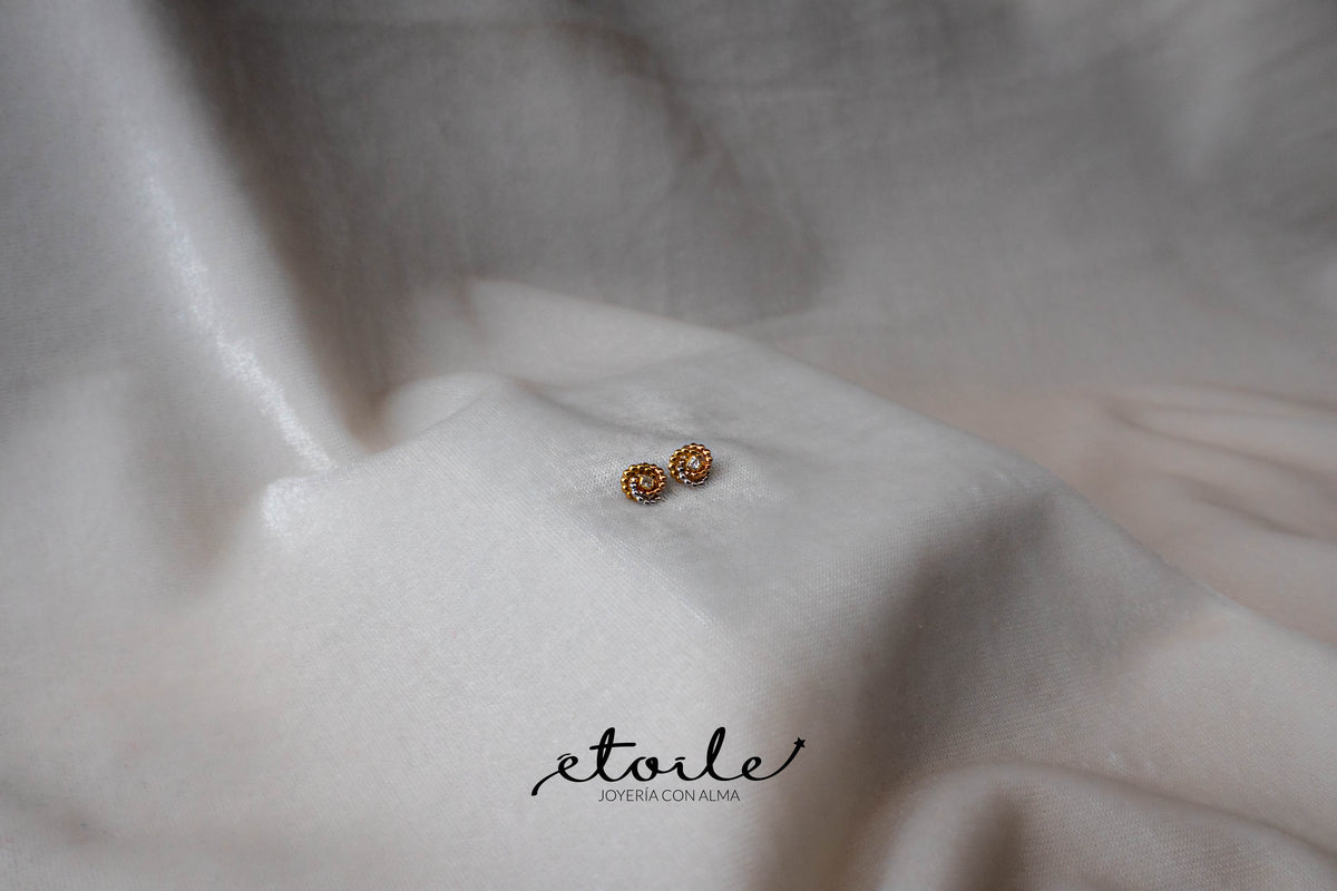 Aretes tres oros